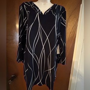 Chico’s tunic style blouse. New with tags.